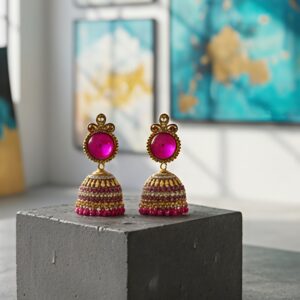 traditional pink stone gold plated jhumka earrings